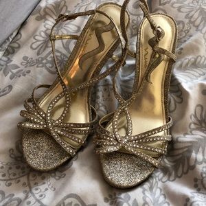 Gold small formal sparkly heels.